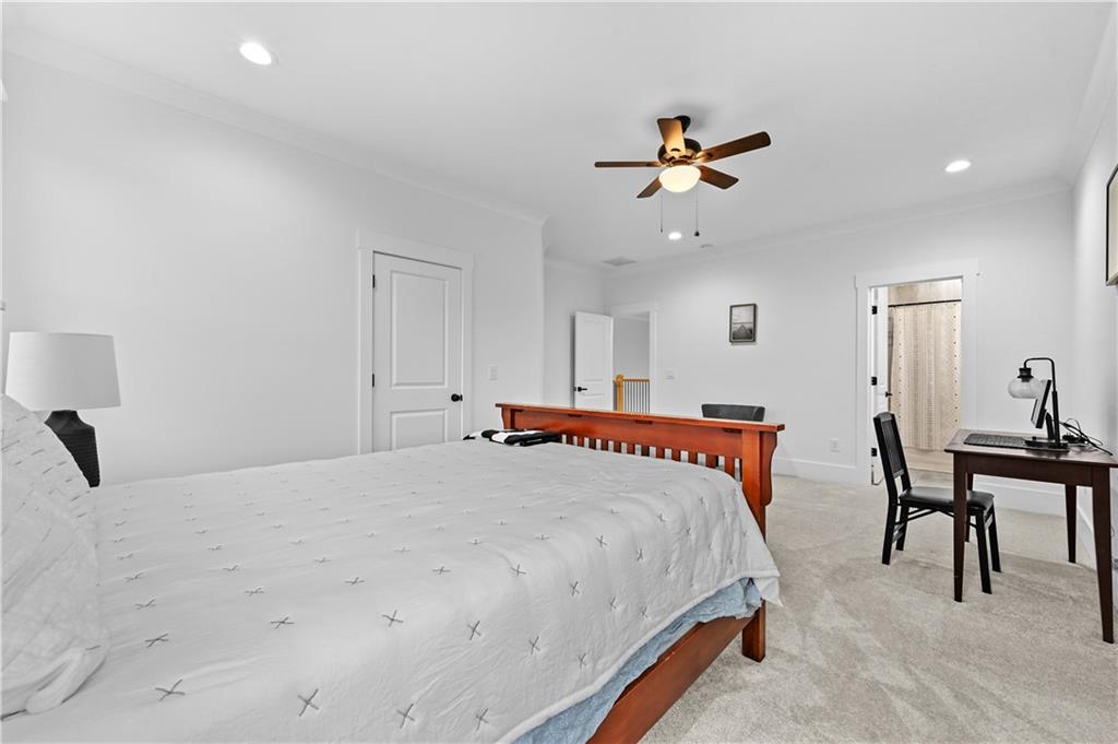 2550 Kilgore Road Buford, GA 30519 - Photo 53 of 64 a bedroom with a bed and a table