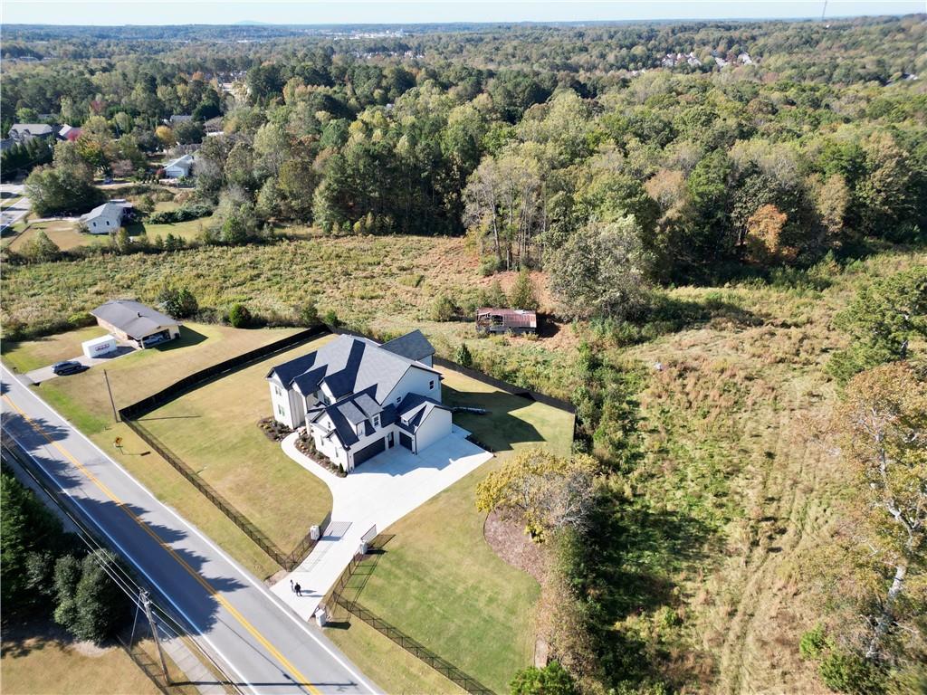 2550 Kilgore Road Buford, GA 30519 - Photo 62 of 64 an aerial view of a house with a yard