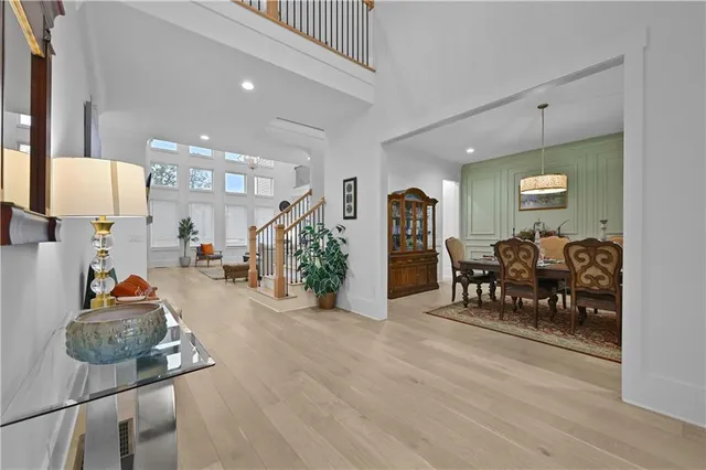 a large kitchen with stainless steel appliances granite countertop a large counter top and a stove