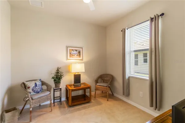 a living room with furniture and a window