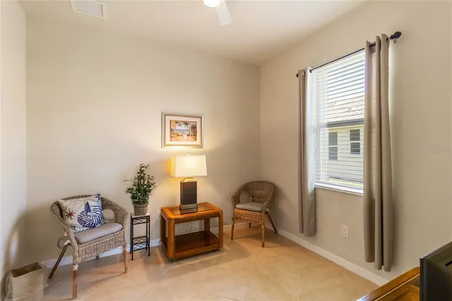a living room with furniture and a window