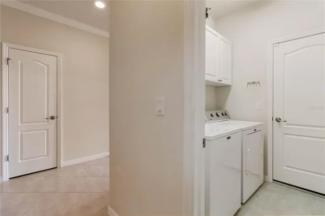 a bedroom with a bed and flat screen tv