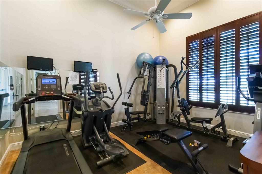 1480 Mossy Oak Drive North Port, FL 34287 - Photo 34 of 39 a view of a room with gym equipment