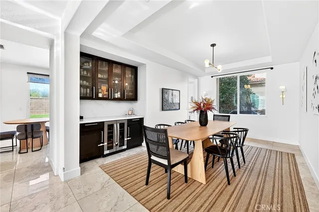 a kitchen with stainless steel appliances a stove a sink and a refrigerator