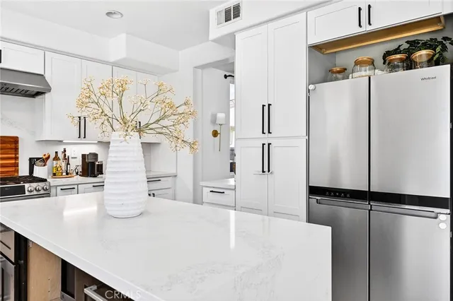 a view of a storage and utility room with a window