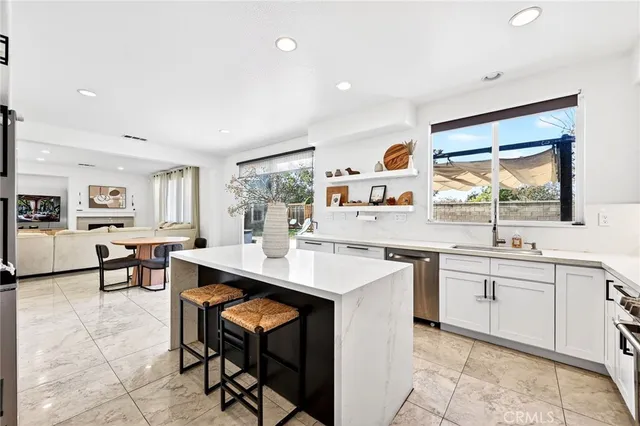 a view of a hallway with seating area