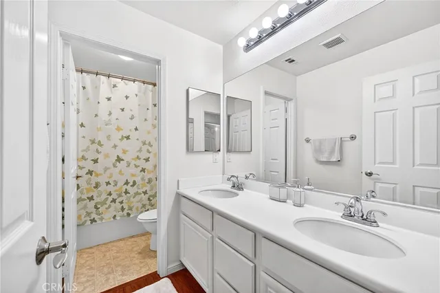 a view of a living room with windows