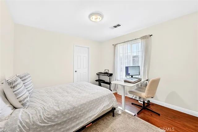 a balcony with view of palm trees