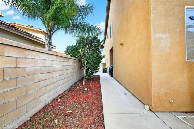 an aerial view of residential houses with outdoor space and river