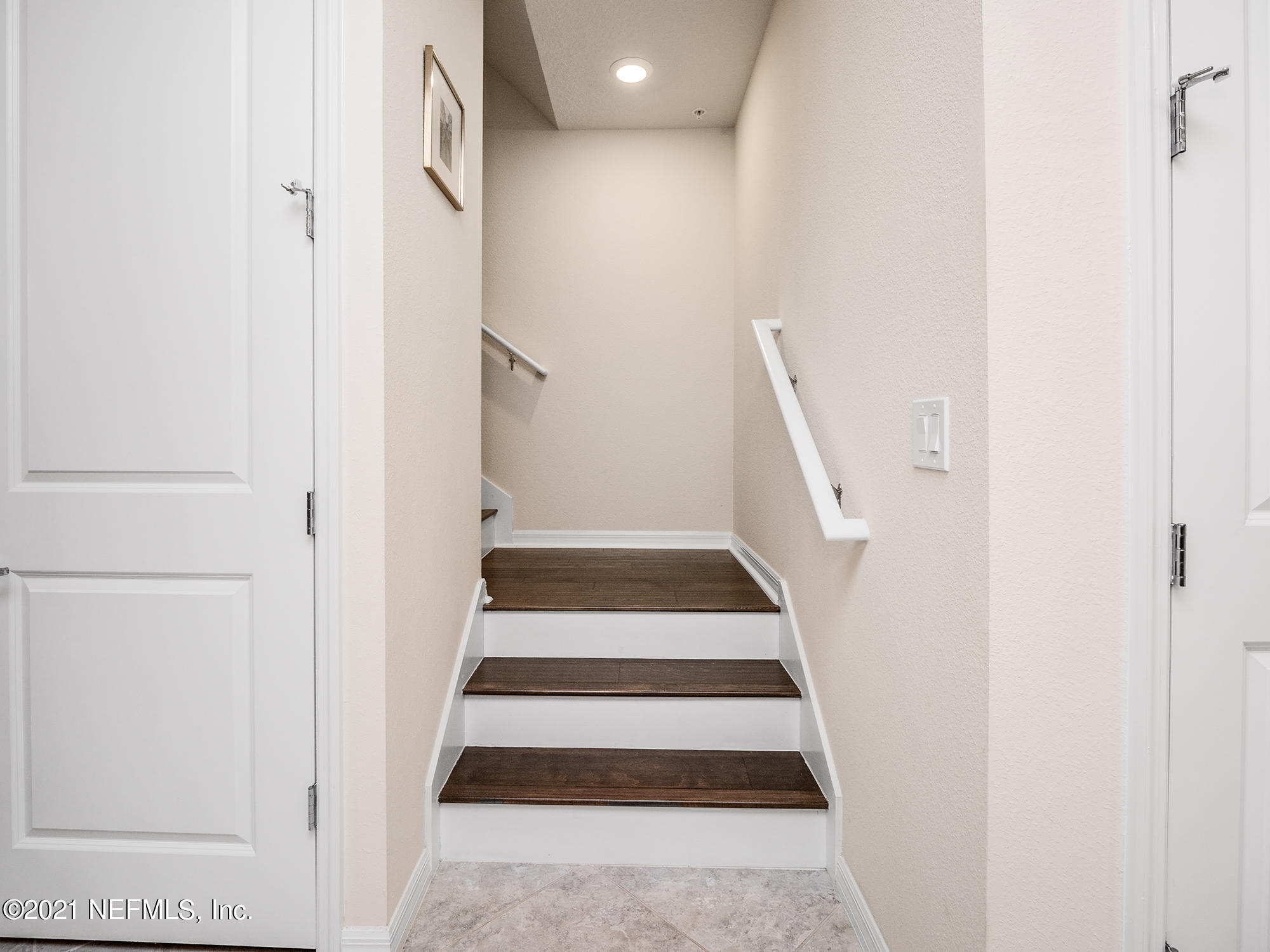 61 Spring Tide Way Ponte Vedra, FL 32081 - Photo 16 of 56 a view of staircase with white walls and white walls