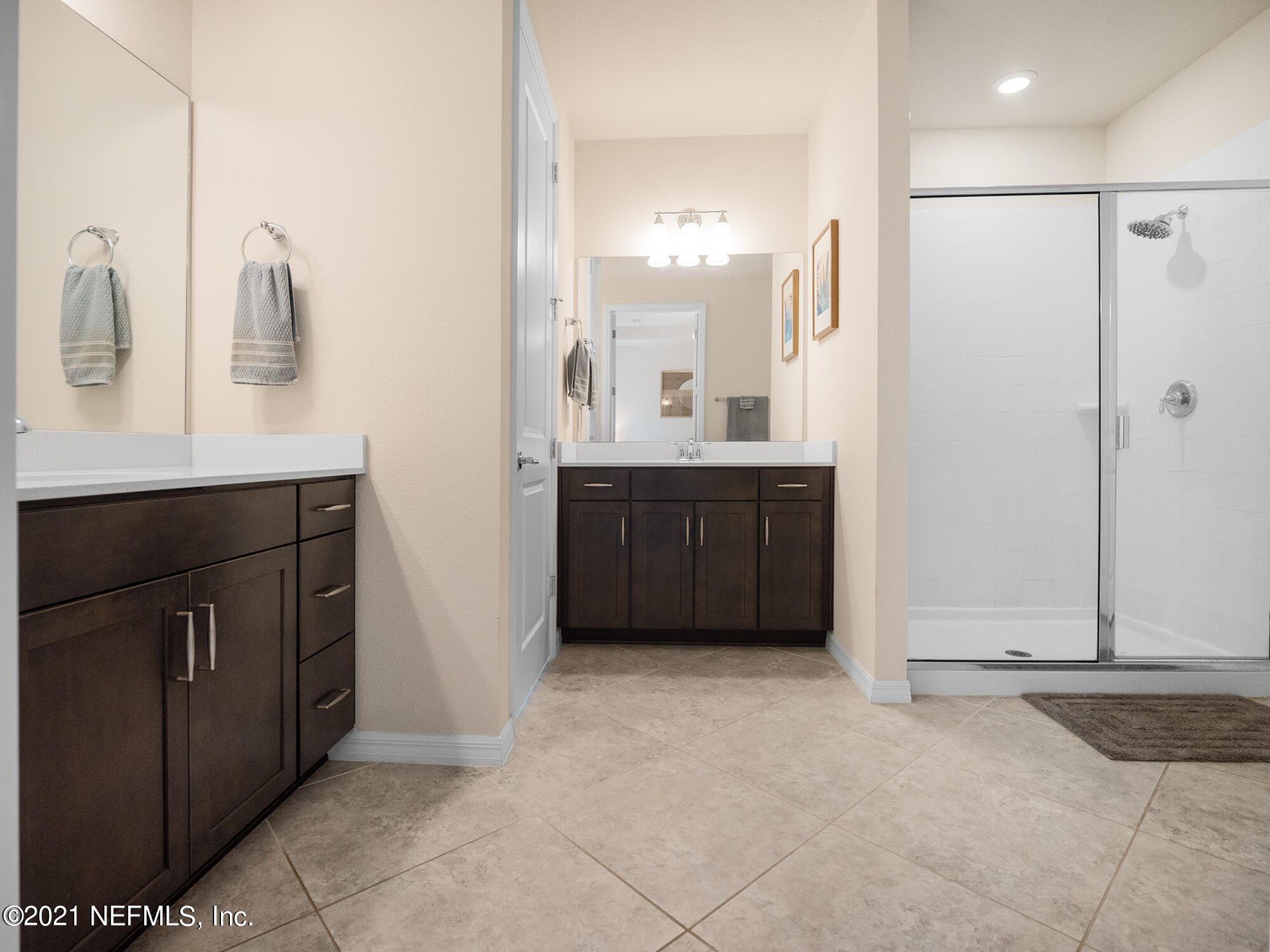61 Spring Tide Way Ponte Vedra, FL 32081 - Photo 19 of 56 a view of a double sink shower and mirror
