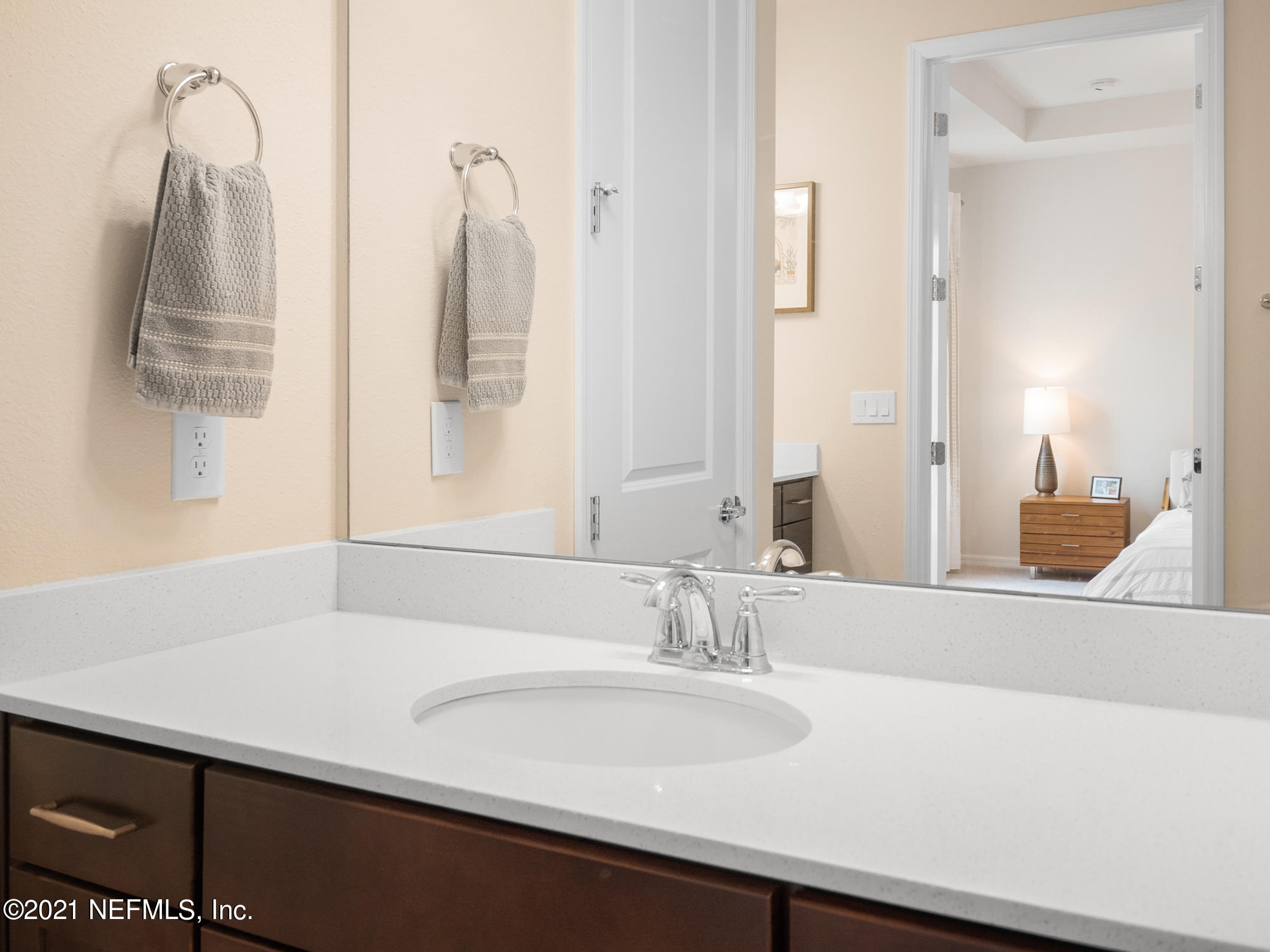 61 Spring Tide Way Ponte Vedra, FL 32081 - Photo 21 of 56 a bathroom with a sink and a mirror