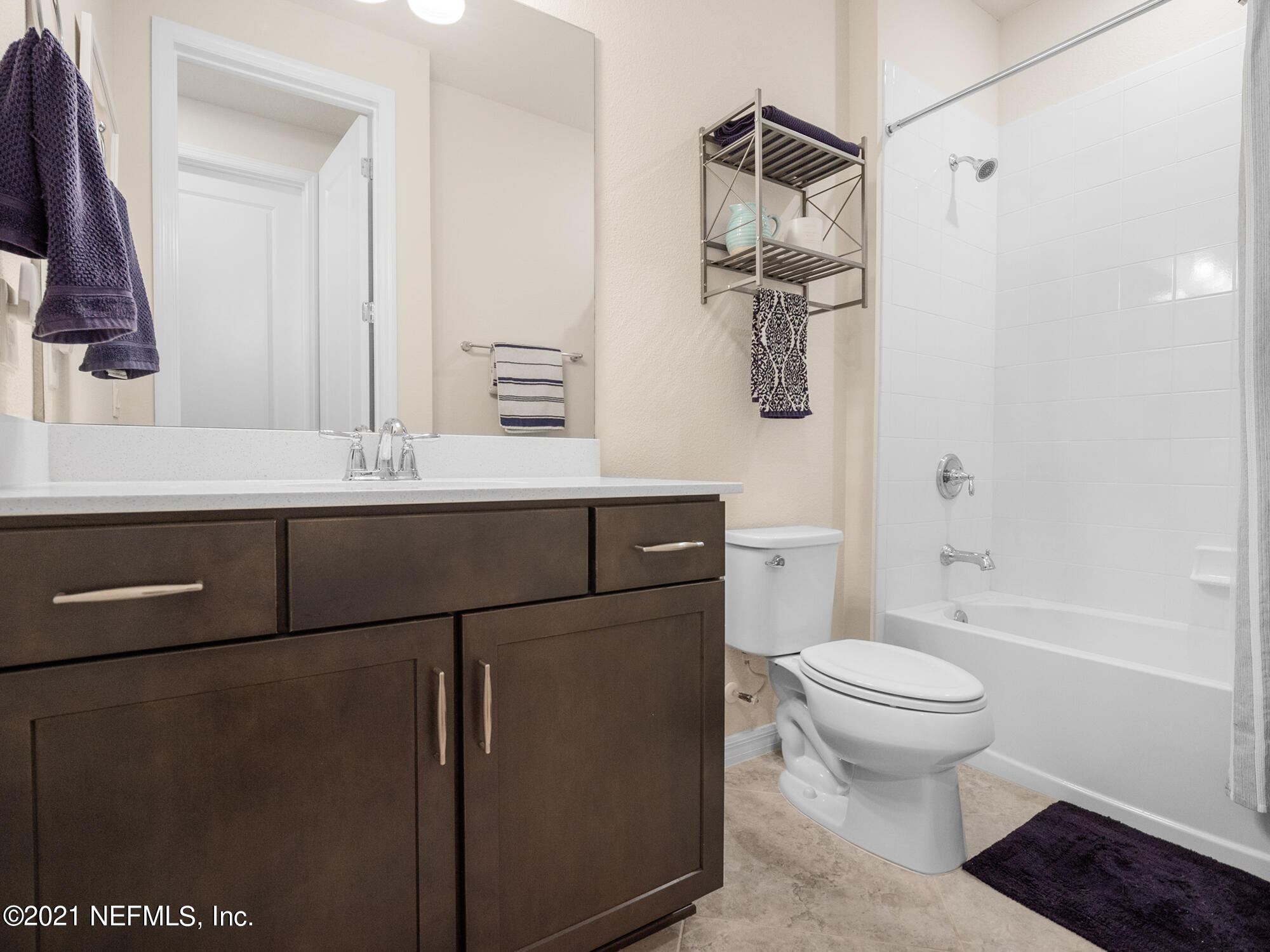 61 Spring Tide Way Ponte Vedra, FL 32081 - Photo 22 of 56 a bathroom with a sink a toilet and shower