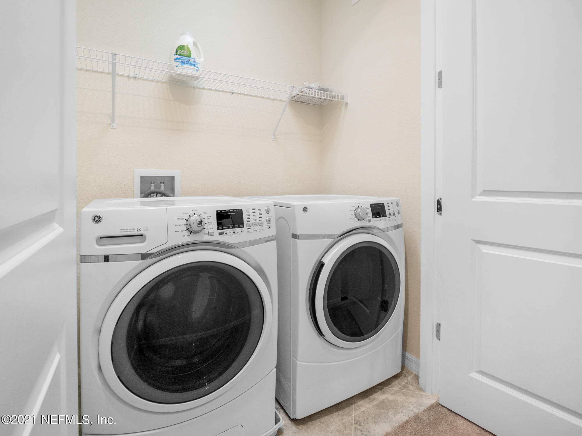 61 Spring Tide Way Ponte Vedra, FL 32081 - Photo 25 of 56 a utility room with dryer and washer