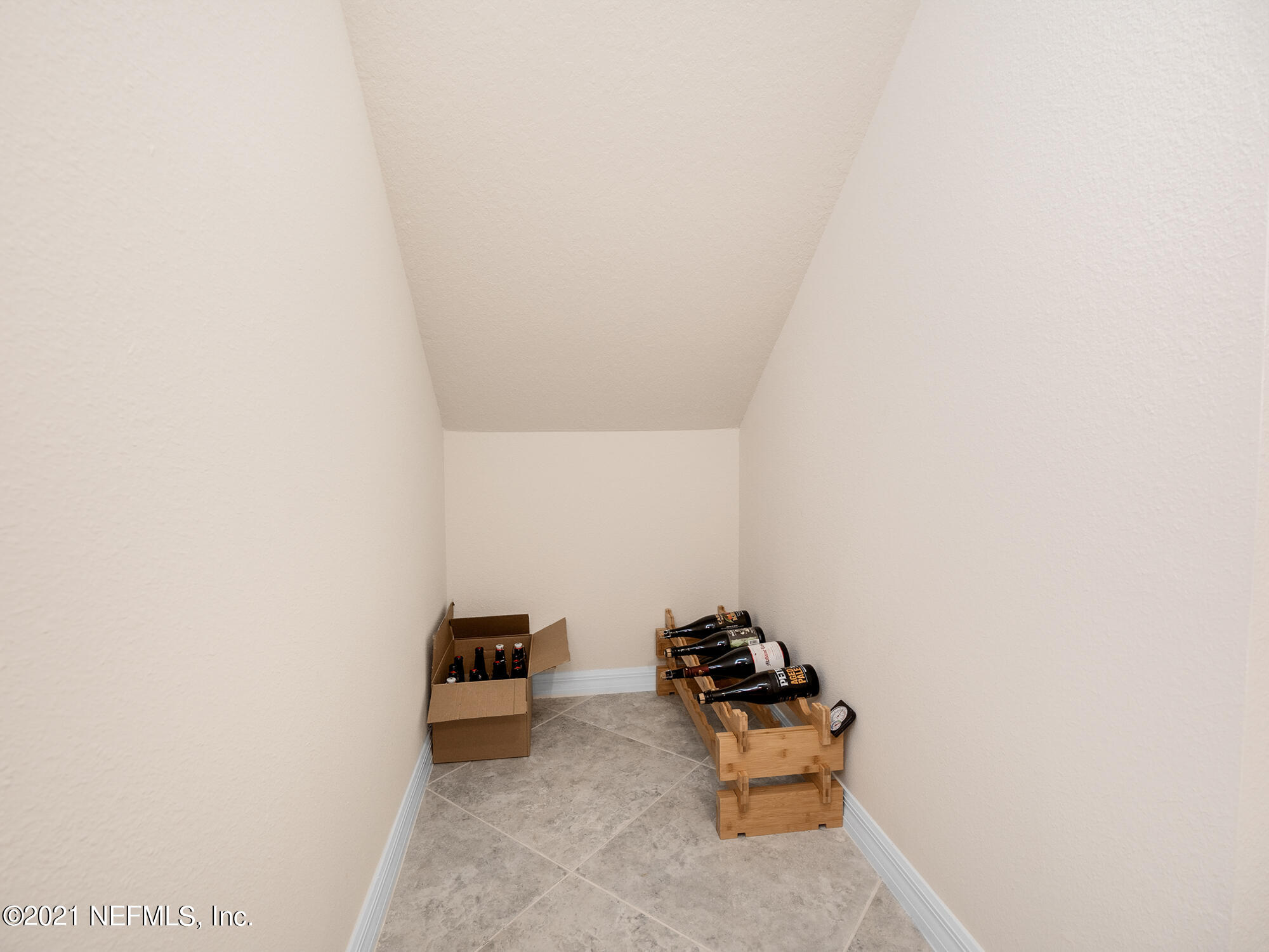 61 Spring Tide Way Ponte Vedra, FL 32081 - Photo 29 of 56 a room with a couch