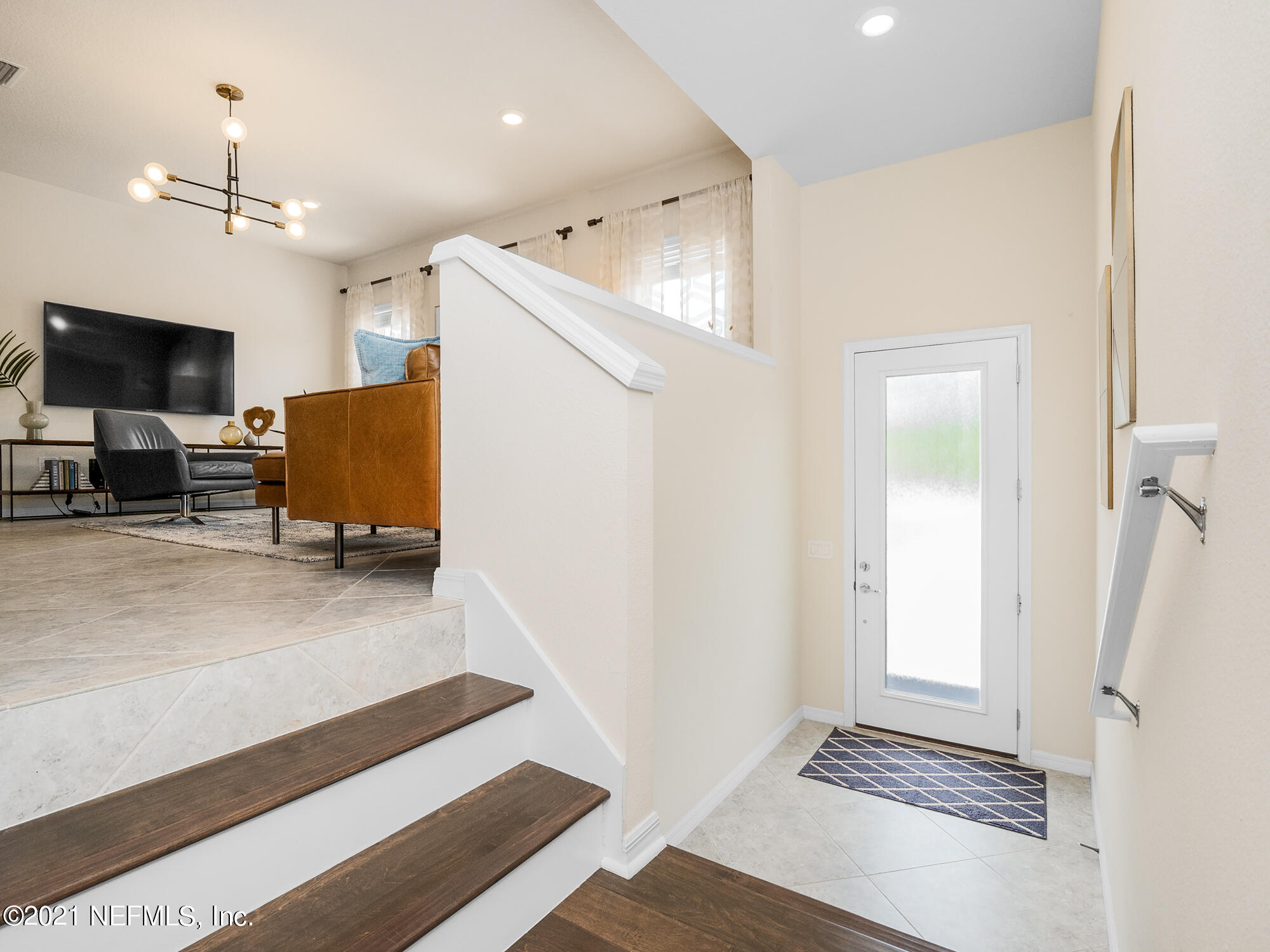 61 Spring Tide Way Ponte Vedra, FL 32081 - Photo 3 of 56 a view of a livingroom with furniture and a flat screen tv
