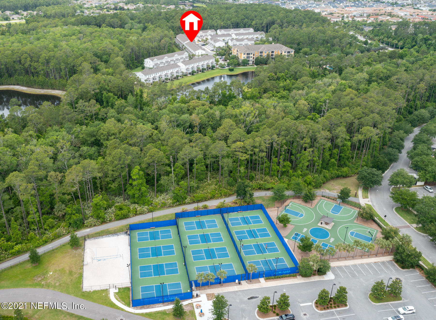 61 Spring Tide Way Ponte Vedra, FL 32081 - Photo 36 of 56 a view of a swimming pool with a yard