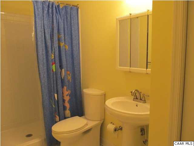 3 Highland Road Palmyra, VA 22963 - Photo 21 of 25 a bathroom with a sink and a toilet