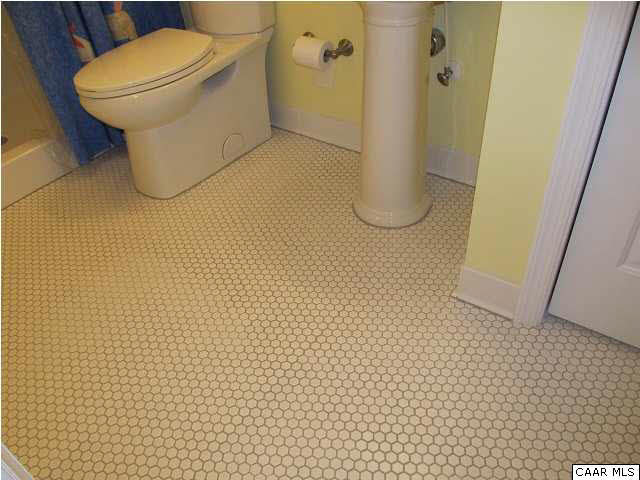 3 Highland Road Palmyra, VA 22963 - Photo 22 of 25 a bathroom with a sink and toilet