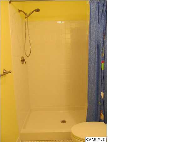 3 Highland Road Palmyra, VA 22963 - Photo 23 of 25 a bathroom with a toilet shower and sink