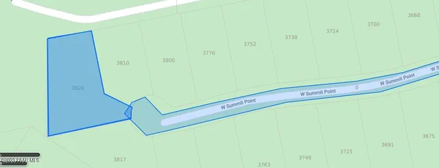 a view of a road with an ocean view