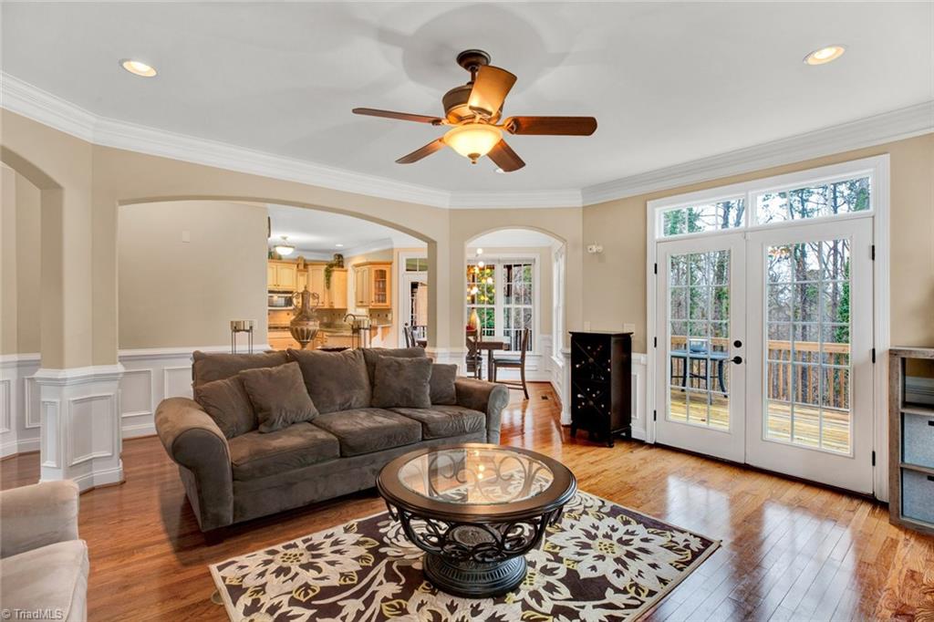 338 Homestead Avenue High Point, NC 27262 - Photo 13 of 25 large living room with gas fireplace and double doors that open up to new deck