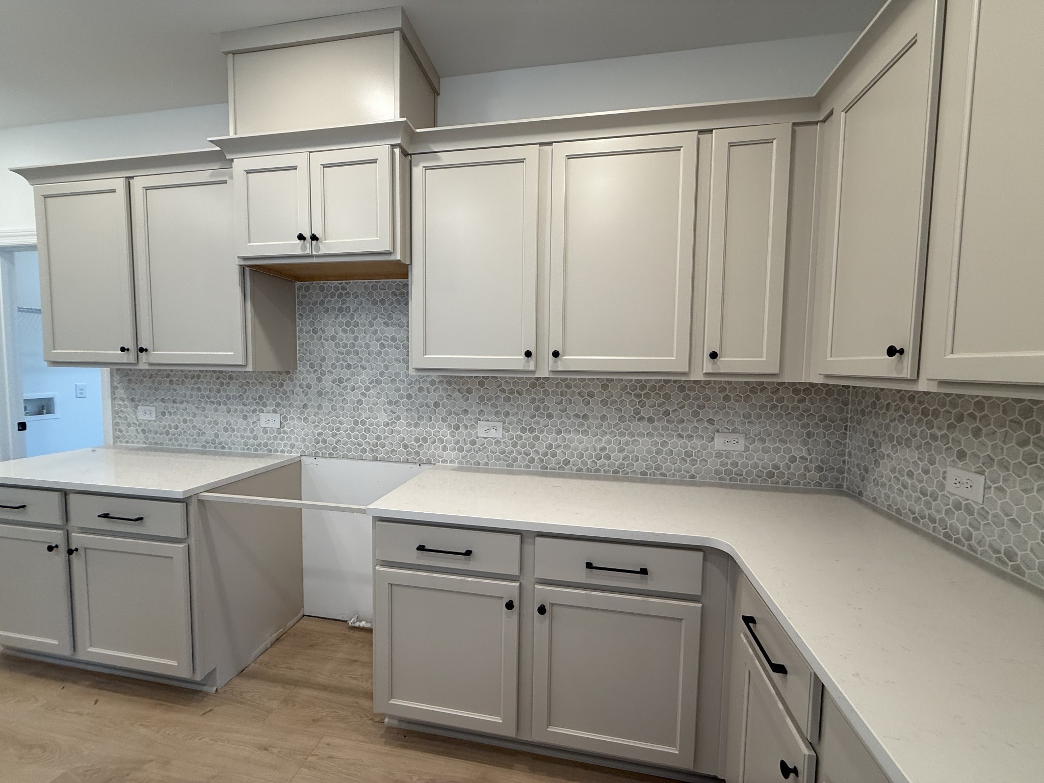 949 Brooklyn Xing Road Gallatin, TN 37066 - Photo 6 of 18 a kitchen with white cabinets and white appliances