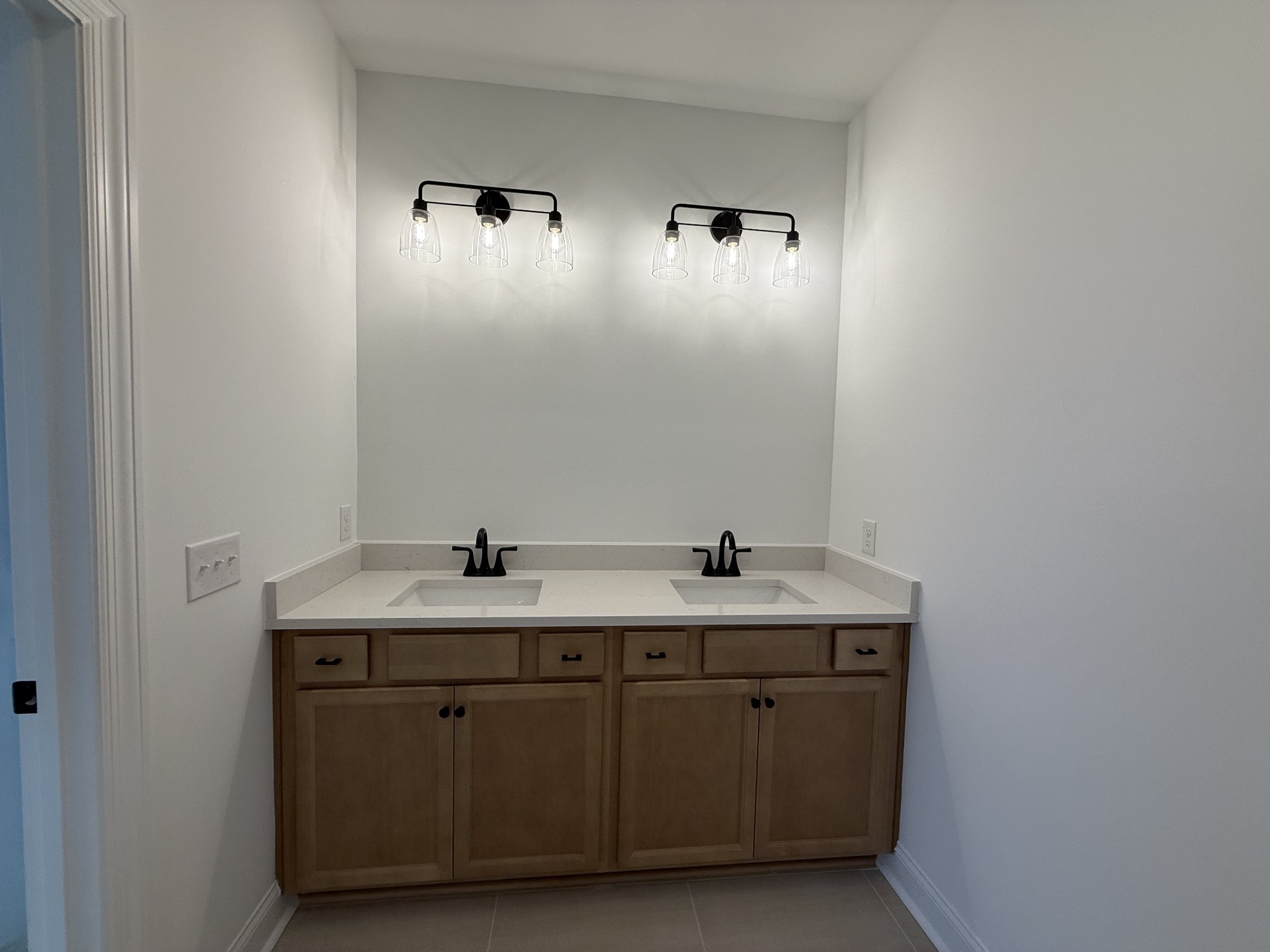 949 Brooklyn Xing Road Gallatin, TN 37066 - Photo 10 of 18 a bathroom with a granite countertop sink a toilet and mirror