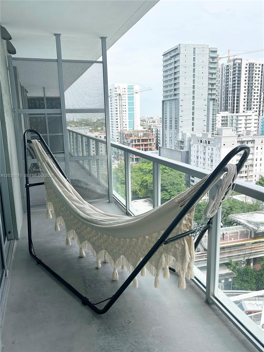 79 Southwest 12th Street, Unit 1710S Miami, FL 33130 - Photo 12 of 25 a view of swimming pool from a balcony