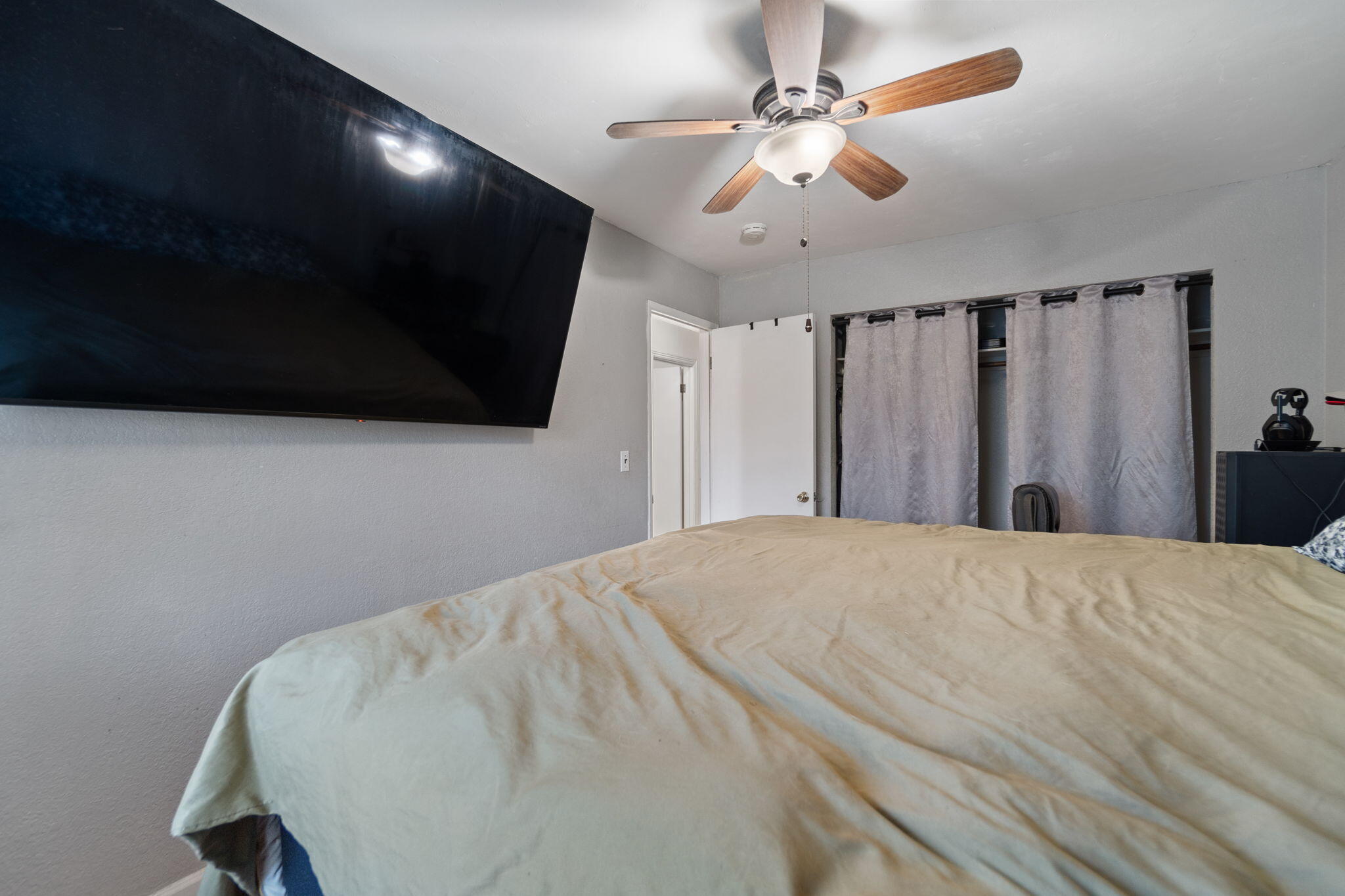 1971 Spruce Circle Anderson, CA 96007 - Photo 14 of 30 a bed room with a bed mirror and a window