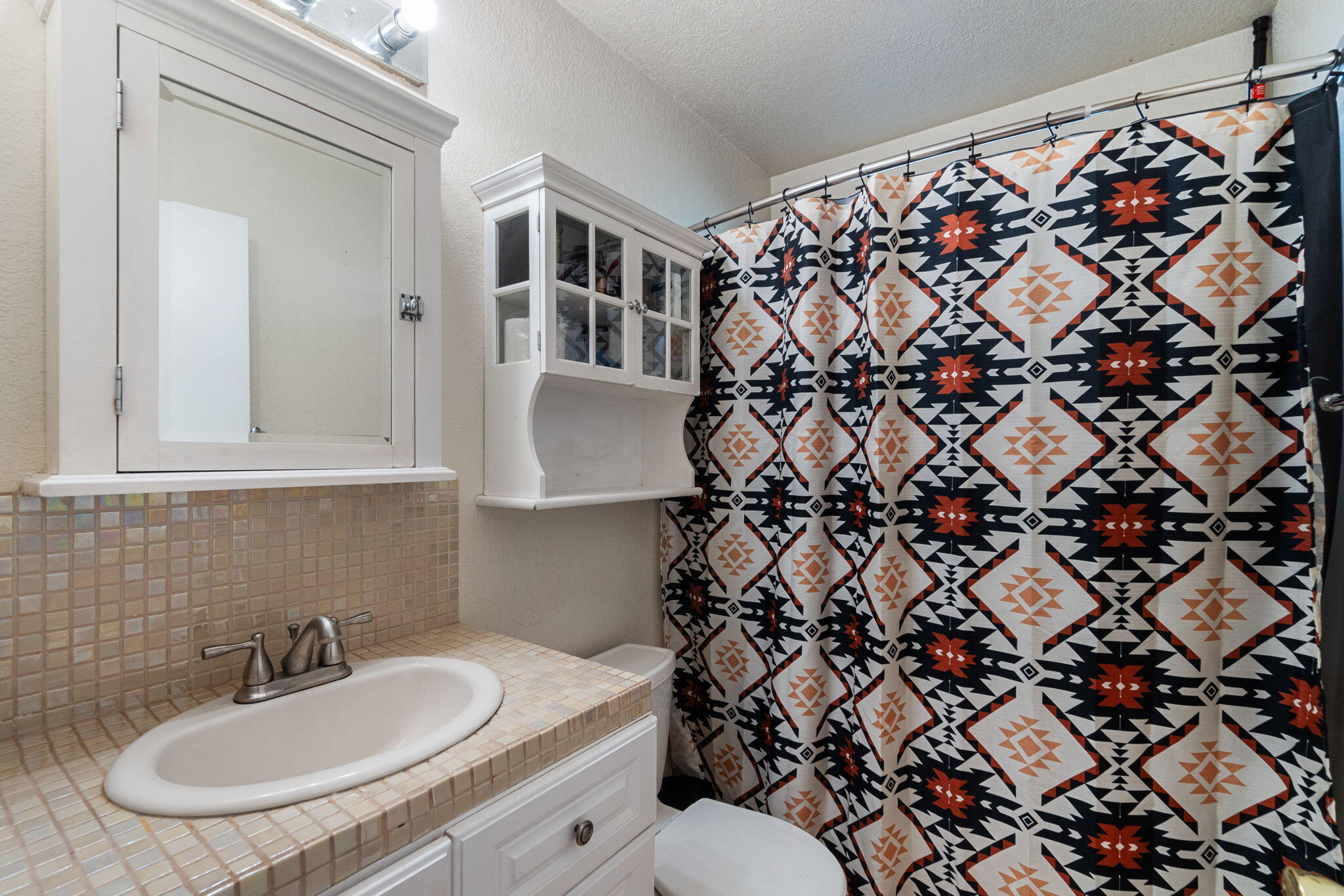 1971 Spruce Circle Anderson, CA 96007 - Photo 15 of 30 a bathroom with a sink and a mirror