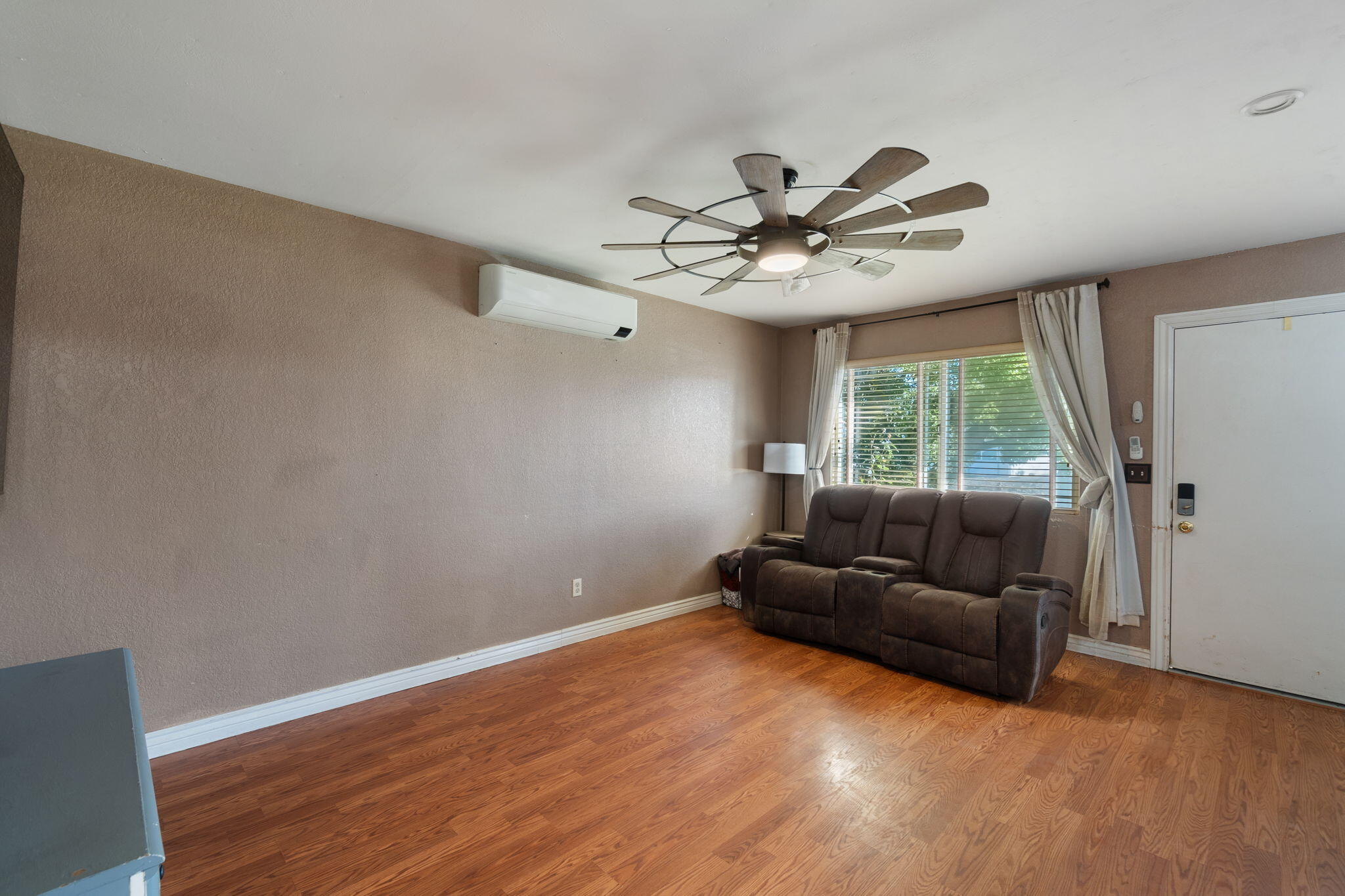 1971 Spruce Circle Anderson, CA 96007 - Photo 9 of 30 a living room with furniture and a large window