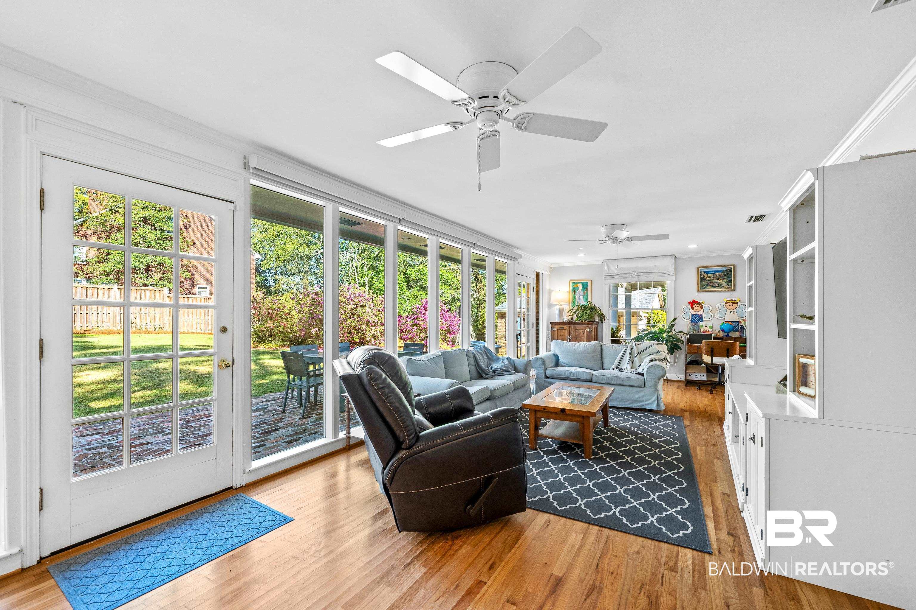 141 Myrtlewood Lane Mobile, AL 36608 - Photo 18 of 44 Sunroom / solarium with visible vents, ornamental molding, and wood finished floors