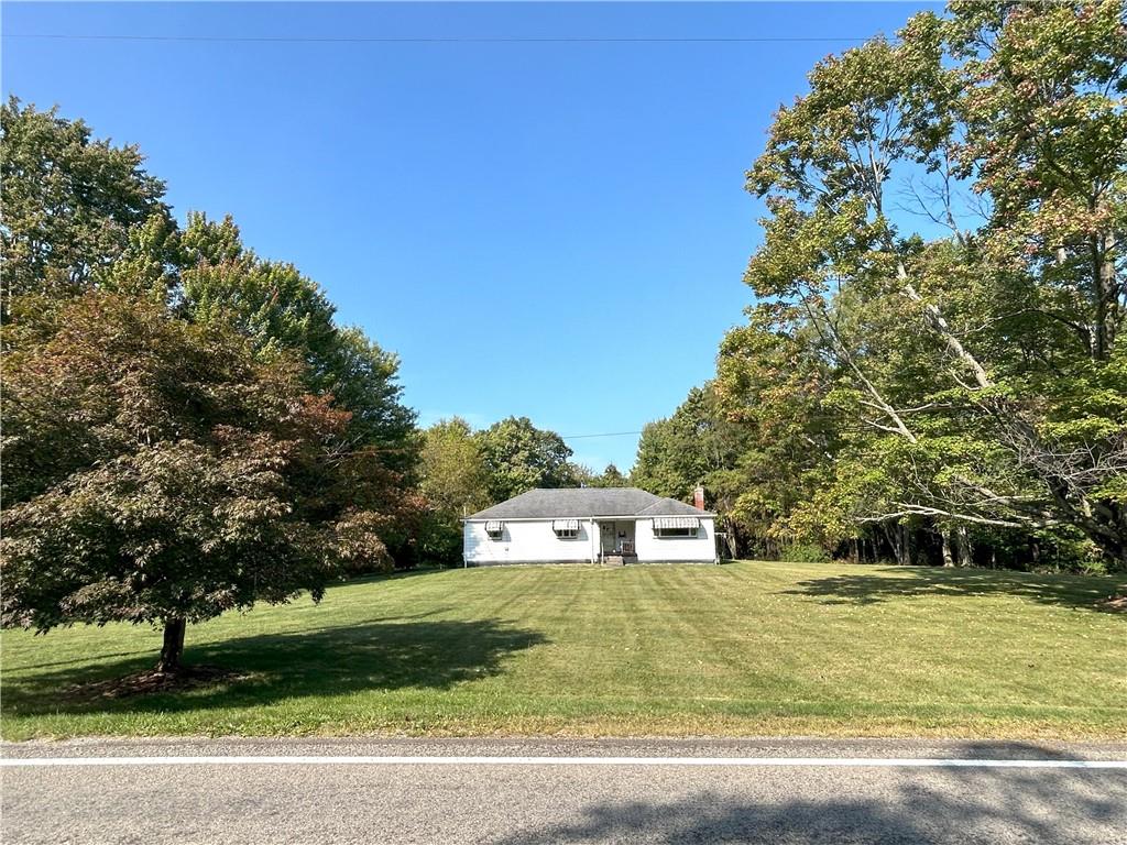 7831 Ridge Road Natrona Heights, PA 15065 - Photo 1 of 39 a view of a house with a yard