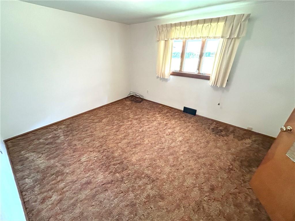 7831 Ridge Road Natrona Heights, PA 15065 - Photo 18 of 39 an empty room with a window