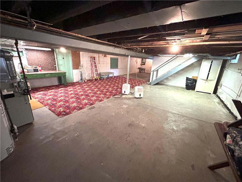 7831 Ridge Road Natrona Heights, PA 15065 - Photo 24 of 39 a view of an empty room with wooden floor