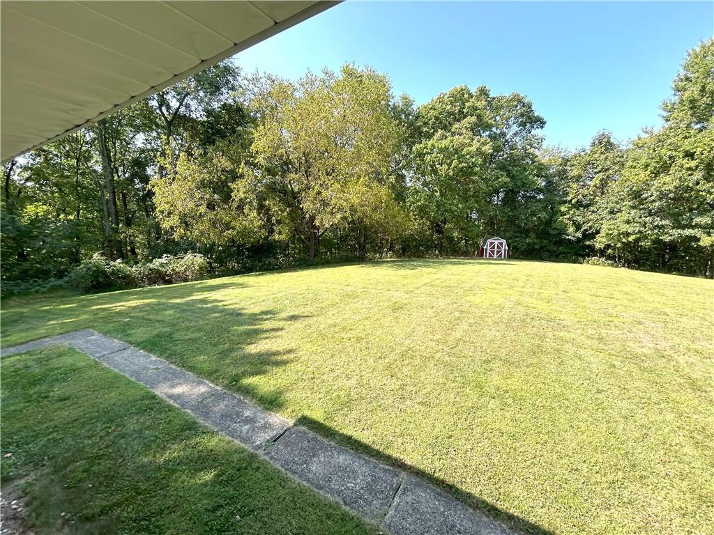 7831 Ridge Road Natrona Heights, PA 15065 - Photo 31 of 39 a view of an outdoor space and a yard
