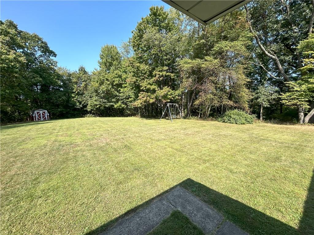 7831 Ridge Road Natrona Heights, PA 15065 - Photo 32 of 39 a view of an outdoor space and a yard