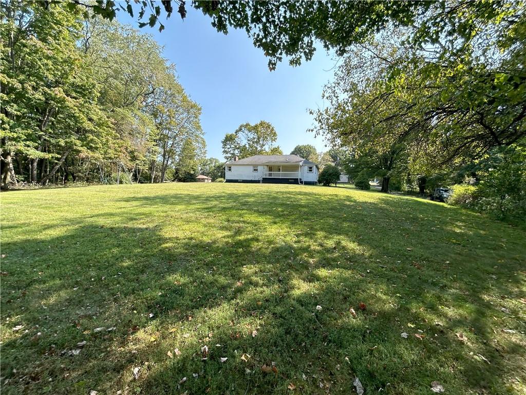 7831 Ridge Road Natrona Heights, PA 15065 - Photo 34 of 39 a big yard with lots of green space and plants