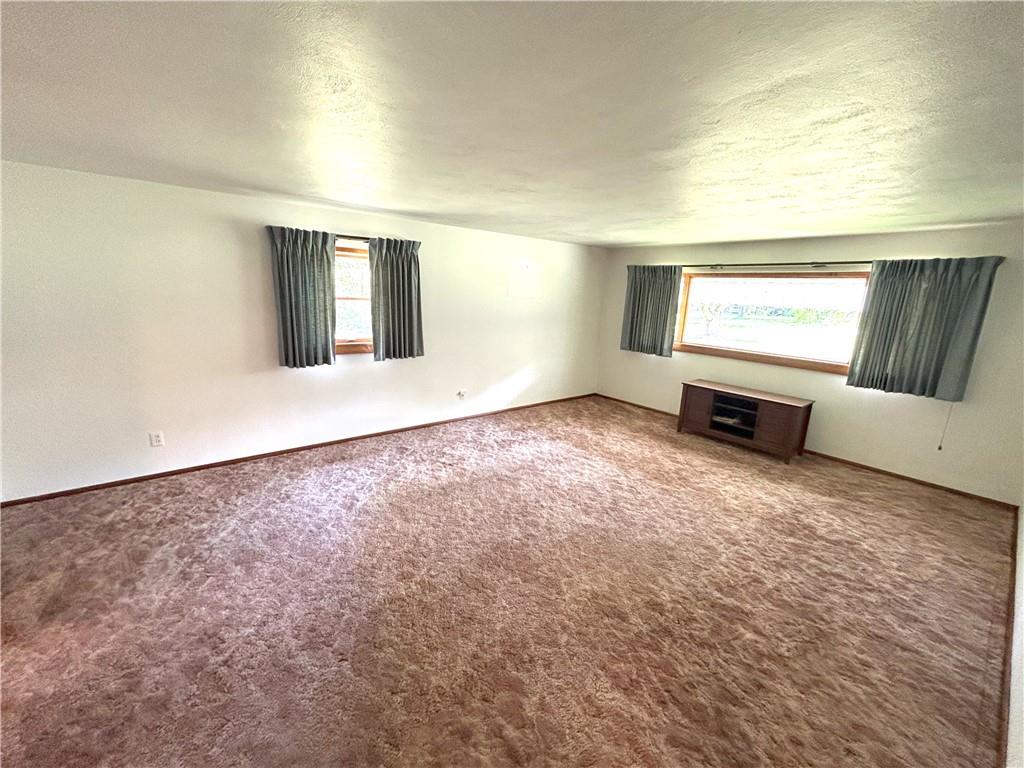 7831 Ridge Road Natrona Heights, PA 15065 - Photo 7 of 39 an empty room with windows