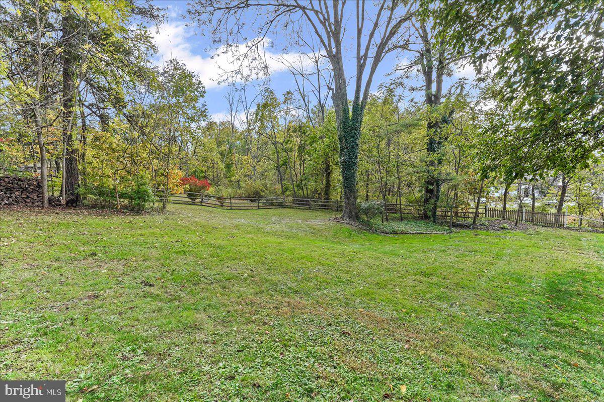 1420 Hollow Road Chester Springs, PA 19425 - Photo 11 of 43 a view of a field with trees in the background