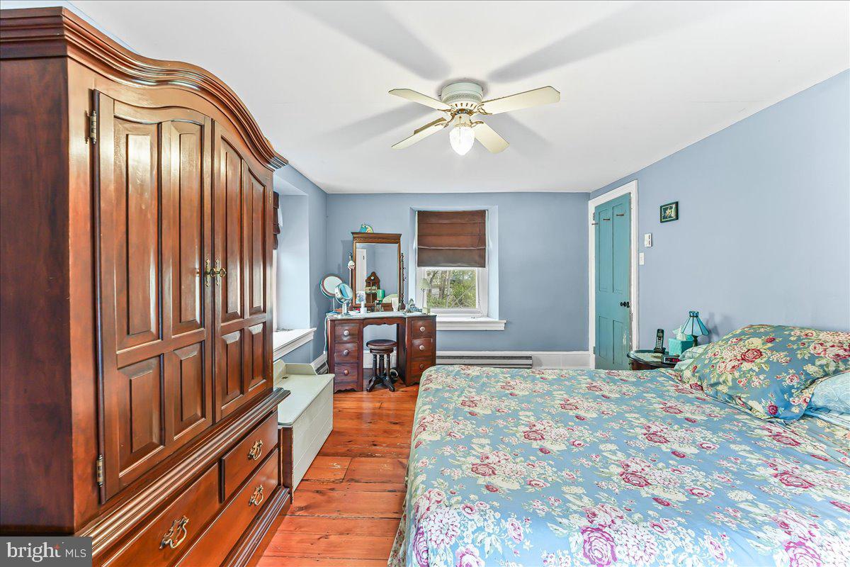 1420 Hollow Road Chester Springs, PA 19425 - Photo 30 of 43 a bedroom with furniture and a window