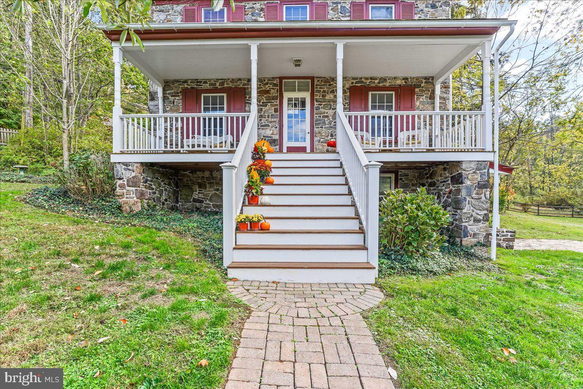 1420 Hollow Road Chester Springs, PA 19425 - Photo 3 of 43 a view of a house with a porch