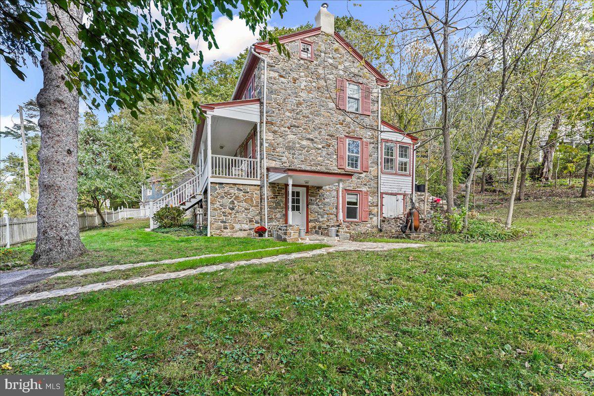 1420 Hollow Road Chester Springs, PA 19425 - Photo 7 of 43 front view of a house with a big yard