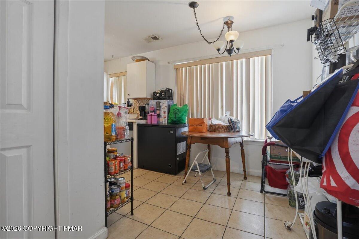 3322 Windermere Drive Bushkill, PA 18324 - Photo 14 of 52 a view of a workspace with furniture and a window