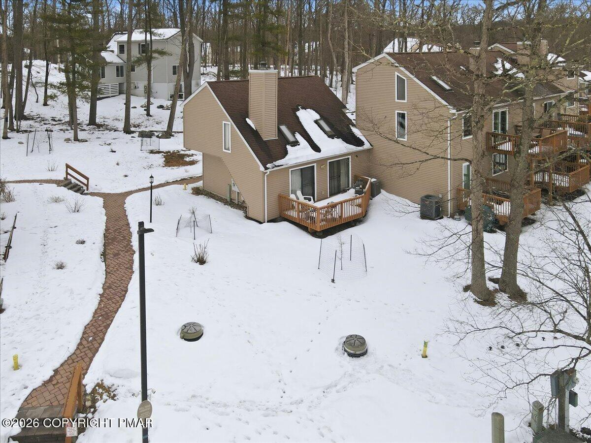 3322 Windermere Drive Bushkill, PA 18324 - Photo 41 of 52 a view of roof house with wooden fence