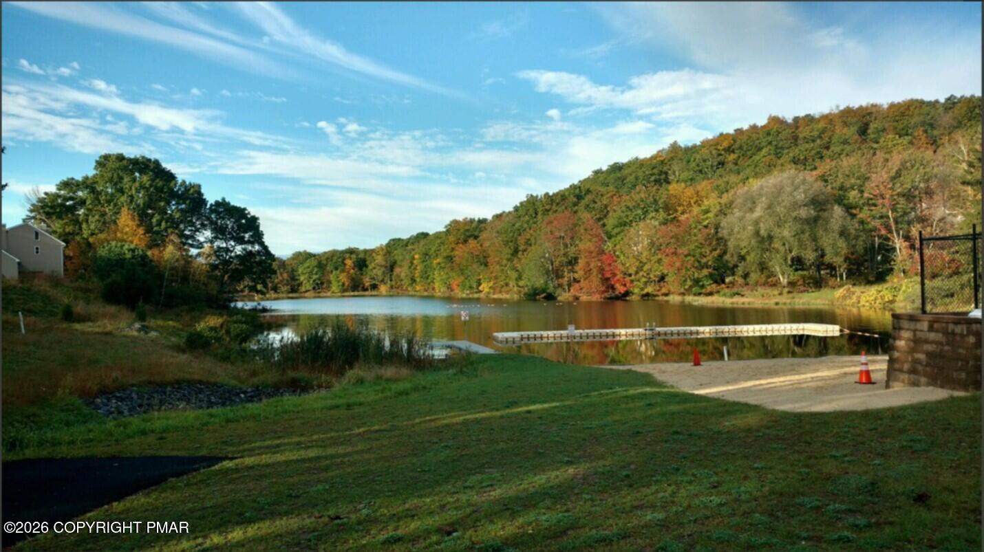 3322 Windermere Drive Bushkill, PA 18324 - Photo 51 of 52 a view of a lake with houses in the background
