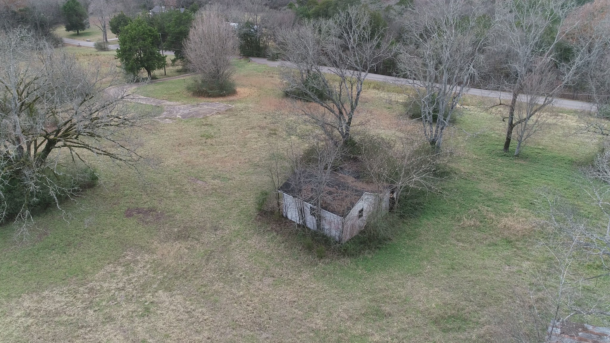 2069 Crescentview Road Pulaski, TN 38478 - Photo 13 of 13 a view of a dry yard with wooden fence