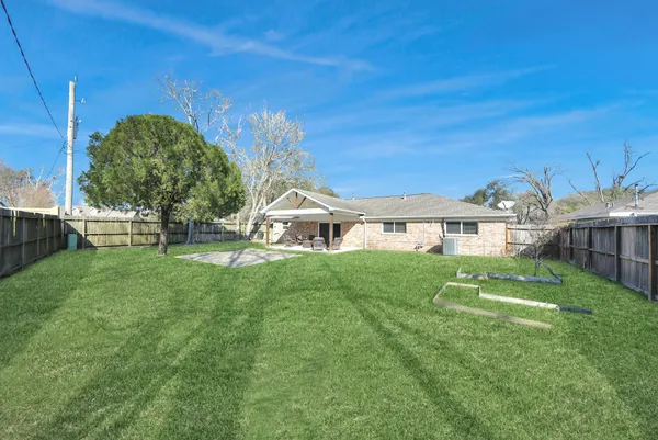 a view of a house with a big yard