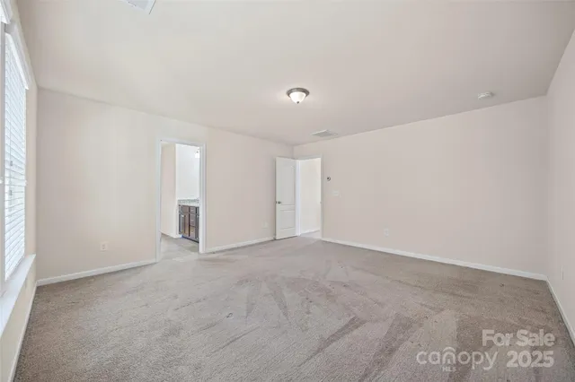 an empty room with an entryway